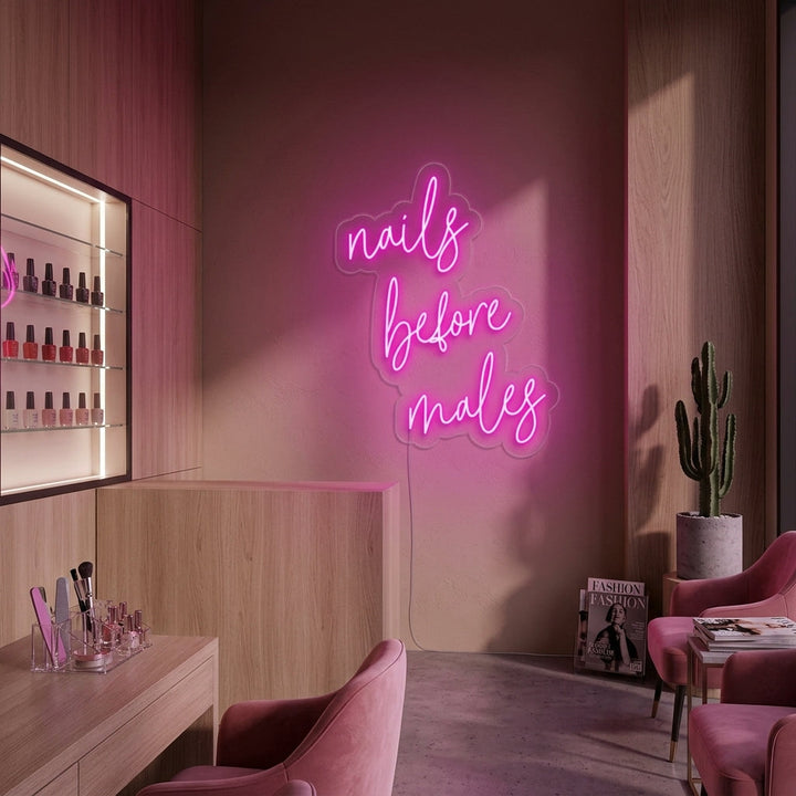 "Nails Before Males" Neonskylt