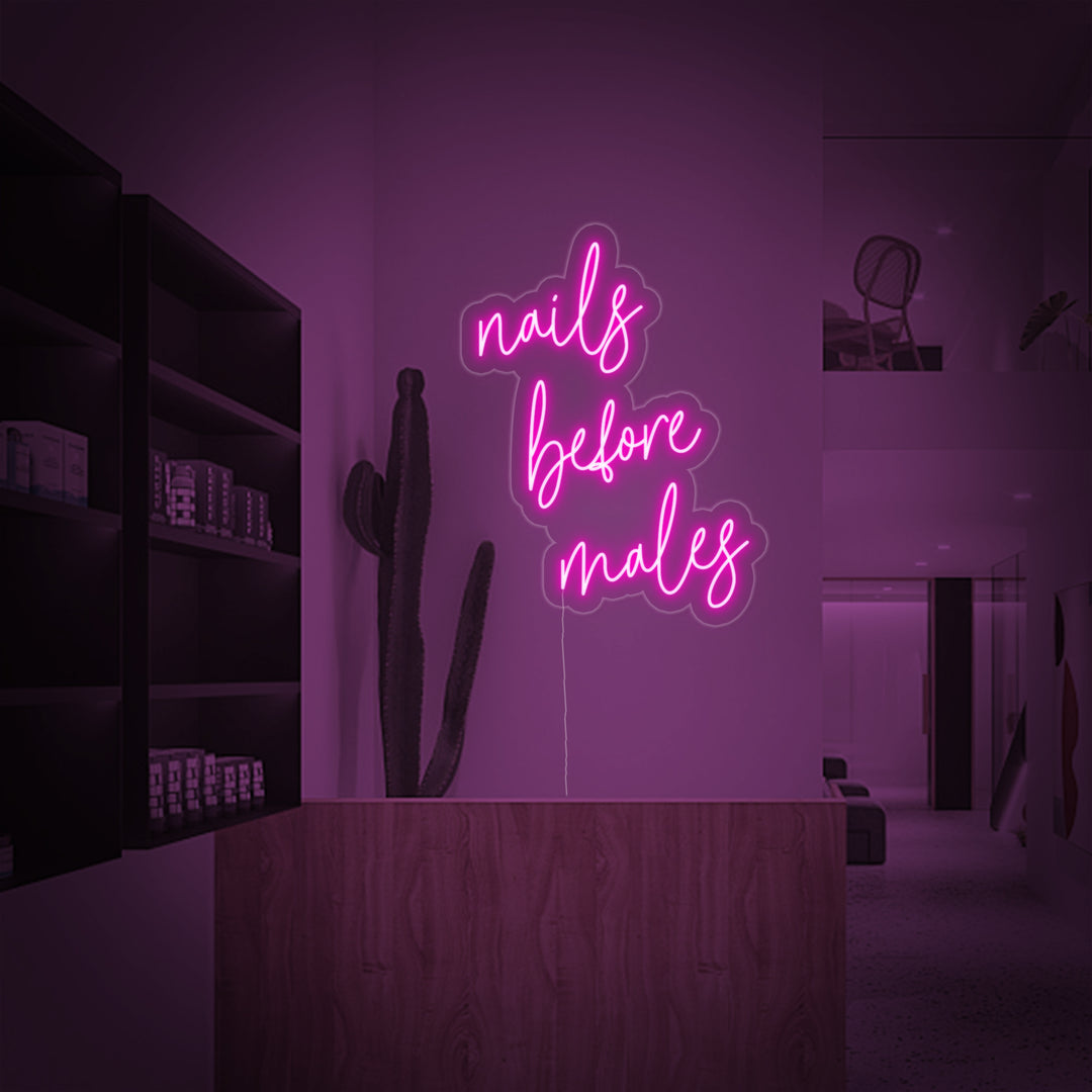 "Nails Before Males" Neonskylt