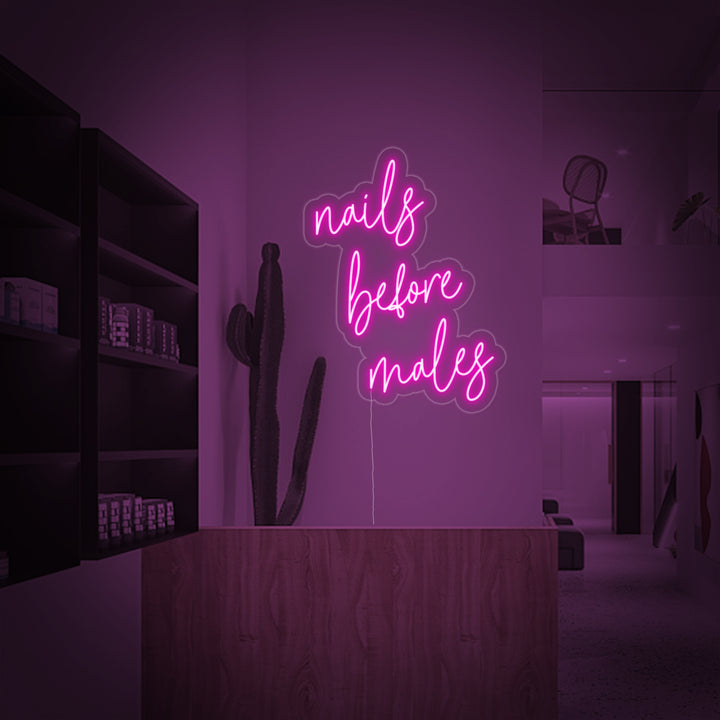"Nails Before Males" Neonskylt