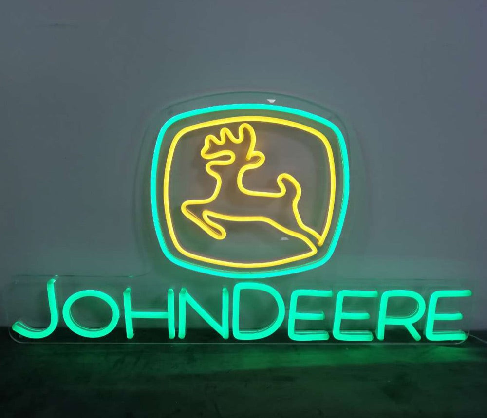Finished John Deere logo neonskylt glowing in green and yellow